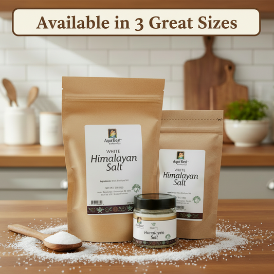 Two packages of White Himalayan Salt with a jar on a kitchen counter.