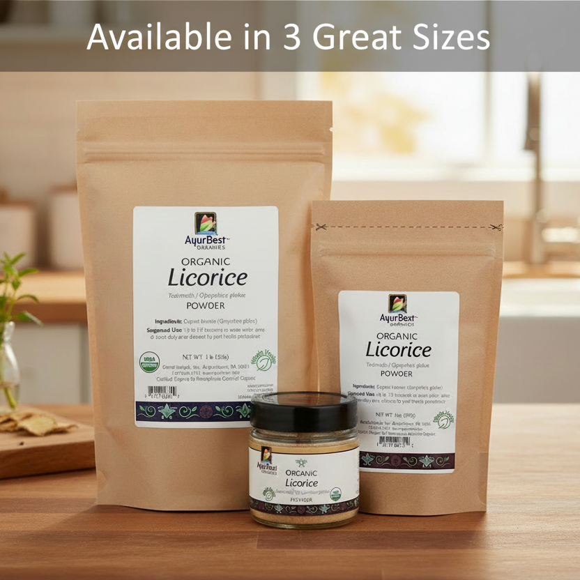 Two packages and a jar of organic licorice powder on a wooden surface with a blurred background.