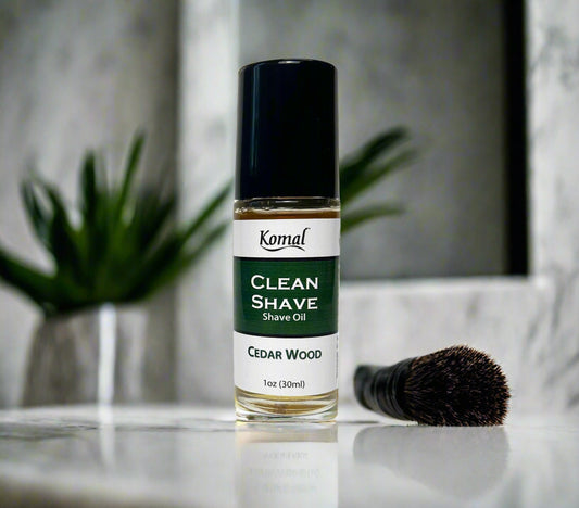 Komal Clean shave oil in a clear glass bottle 1 oz