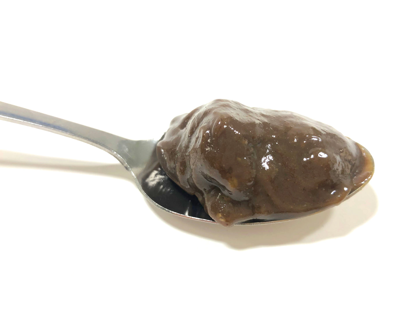 Organic Praas Chyawanprash herbal jam on a spoon