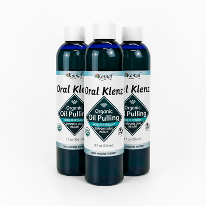 Bottle of Oral Klenz Organic Oil Pulling with Peppermint on a white background