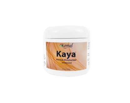 A jar of Kaya Herbal Moisturizer with a label showing the brand name and 'Sandalwood' as the scent.