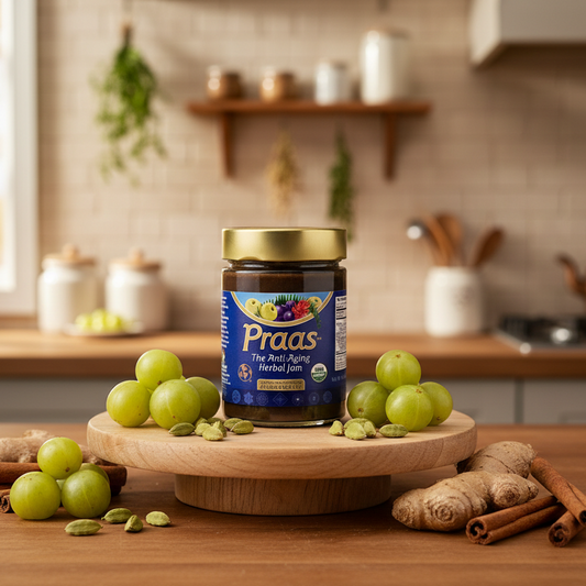 Praas jar on a wooden stand with organic amalaki and spices in a kitchen setting