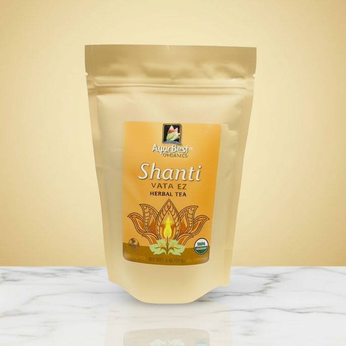 Shanti Vata EZ Herbal Tea package on a marble surface with a beige background