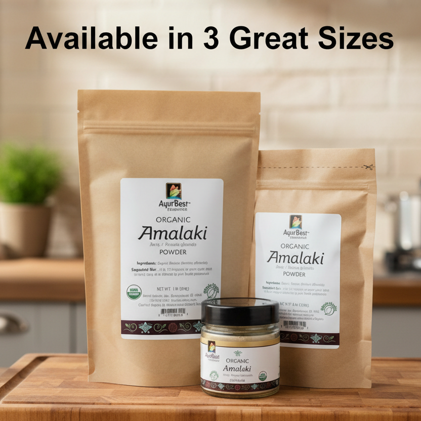 Three package options of Organic Amalaki Powder and a jar on a wooden surface with a blurred kitchen background.