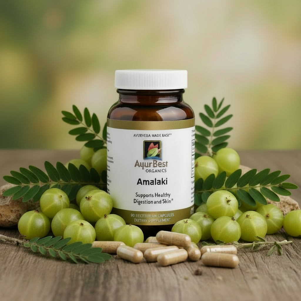 AyurBest Organics Amalaki supplement bottle with fresh amalaki fruits on a wooden surface.