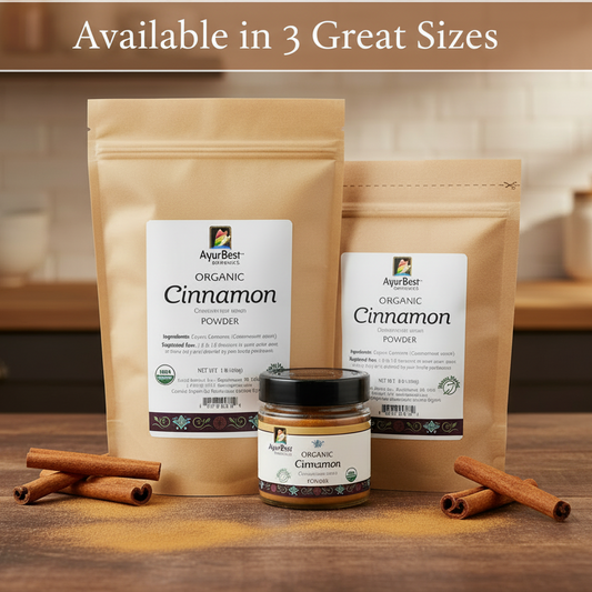 Two packages and a jar of AyurBest Organic Cinnamon Powder on a wooden surface.