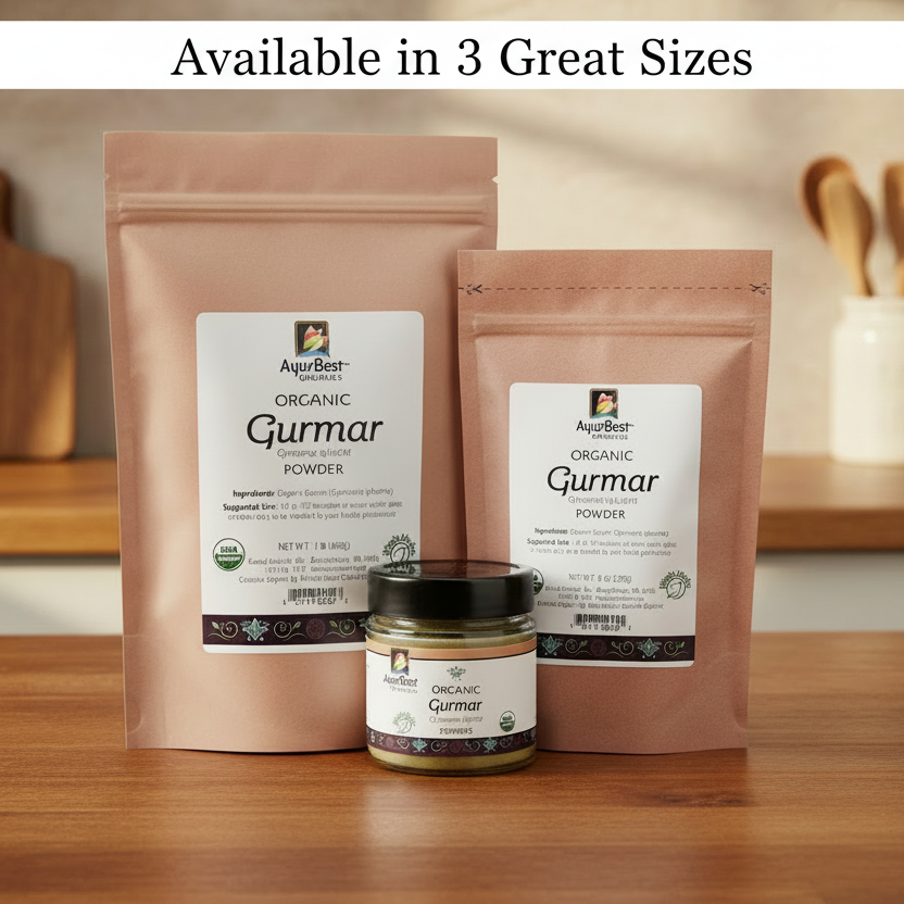 Two packages and a jar of Organic Gurmar Powder on a wooden surface with a neutral background.
