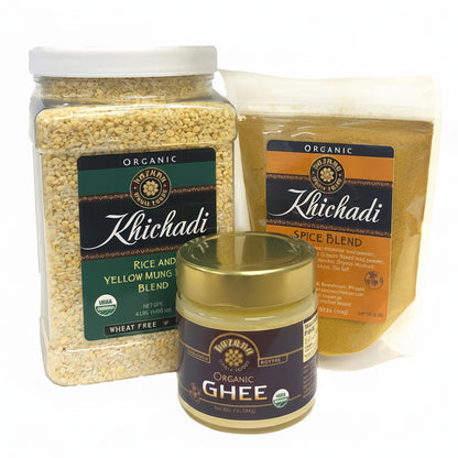 Three containers of organic food including Khichadi Rice/Mung blend, Khichadi Spice, and Ghee.