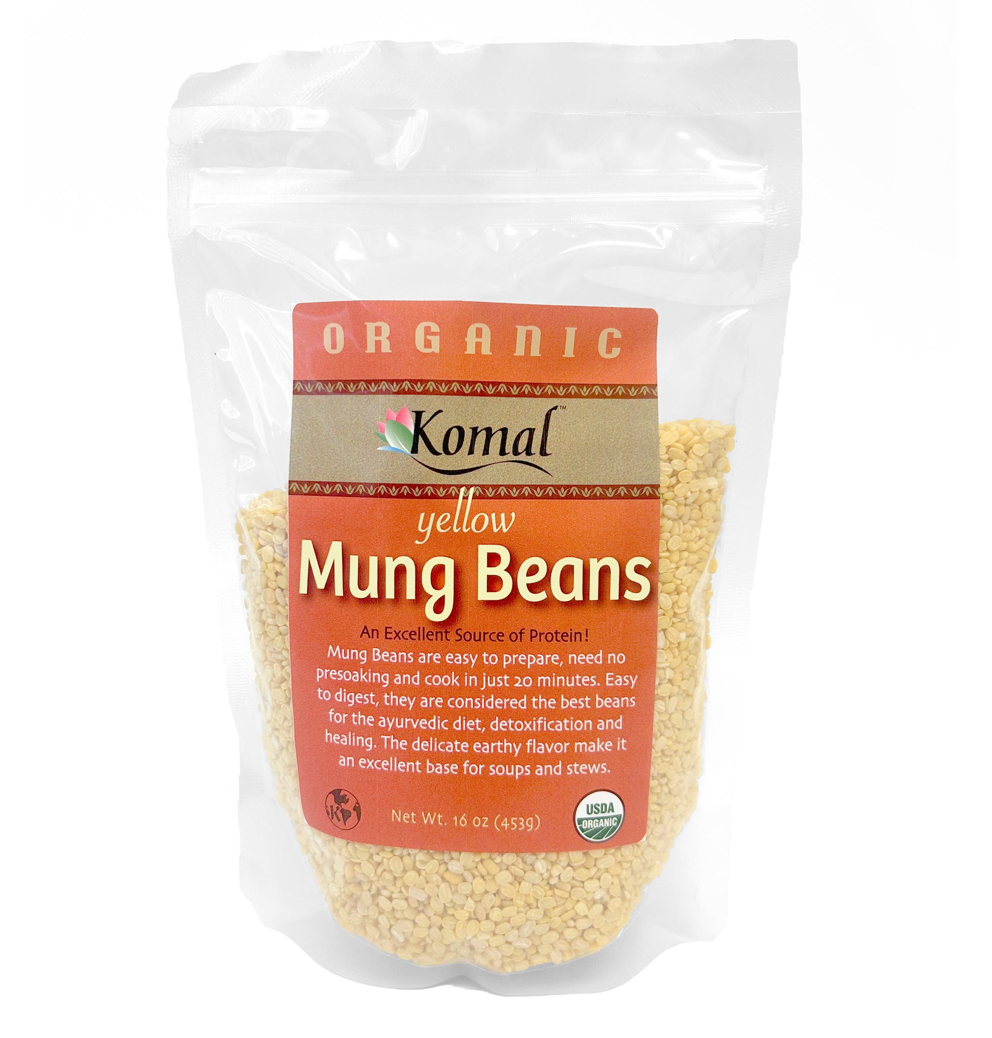 Packaged yellow mung beans with Komal branding on a white background