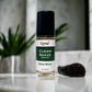 Komal Clean shave oil in a clear glass bottle 1 oz