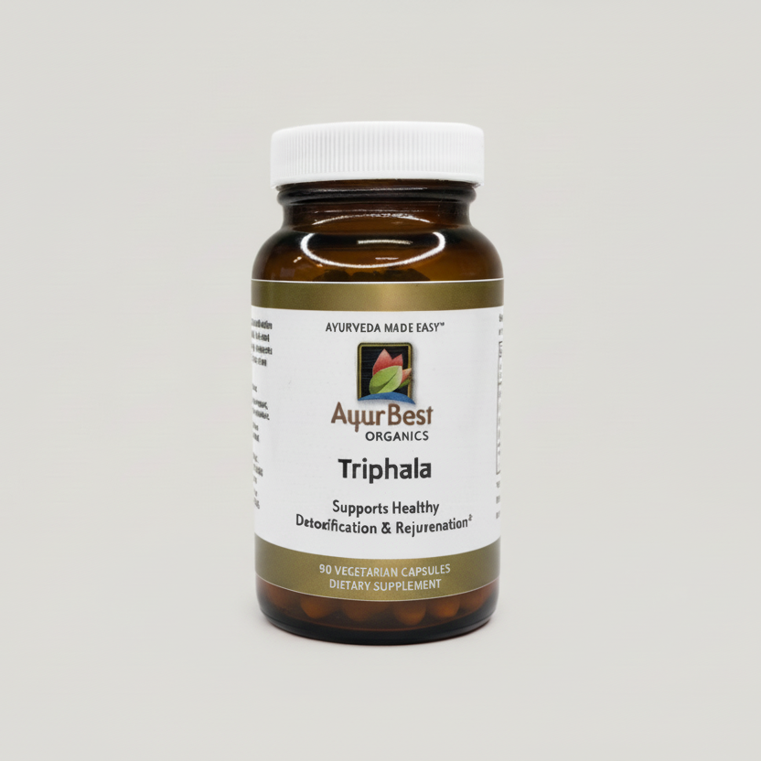 Bottle of AuurBest Organics Triphala supplement on a gray background