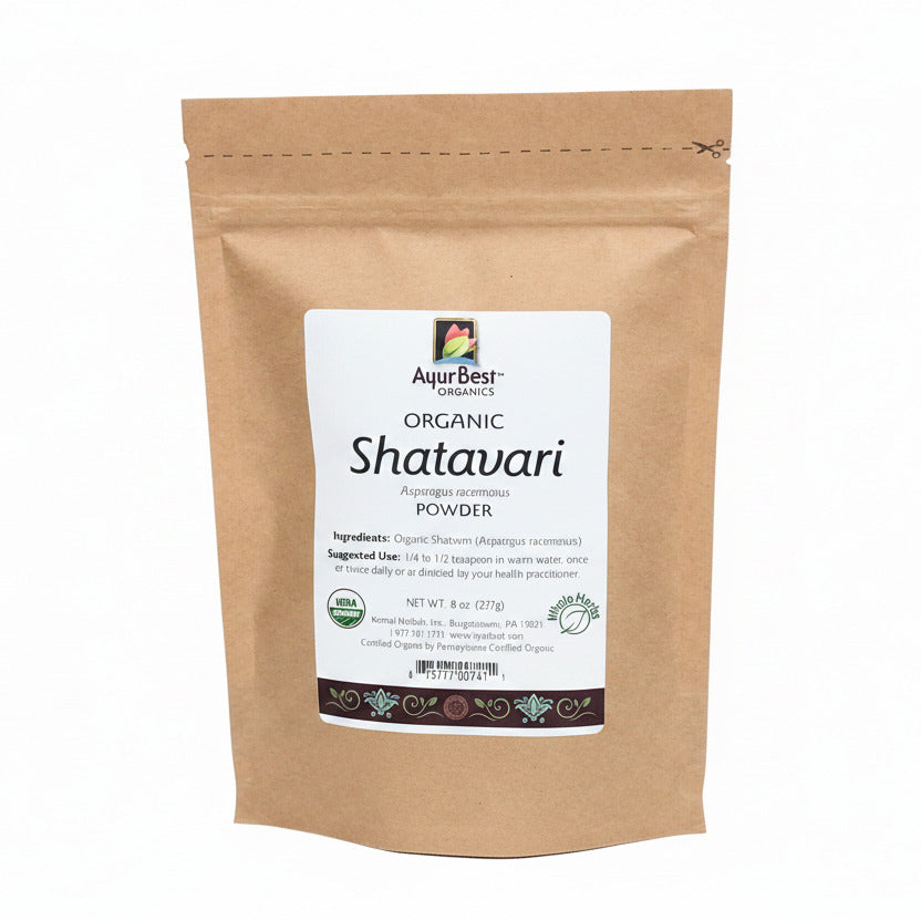 A bag of organic Shatavari powder, with a label showing the product name and organic certification.