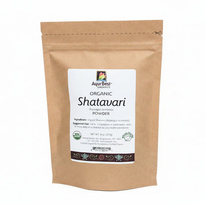 A bag of organic Shatavari powder, with a label showing the product name and organic certification.