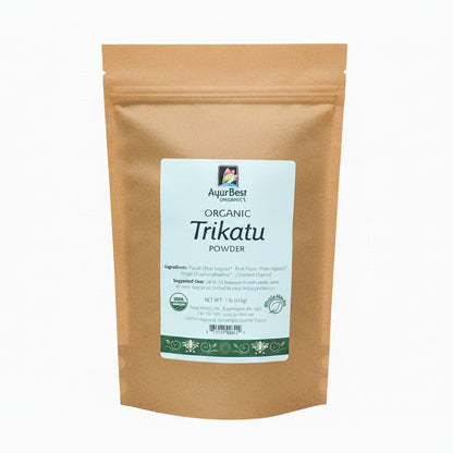 A bag of AyurBest Organic Trikatu Powder, with a label showing the product name and description.