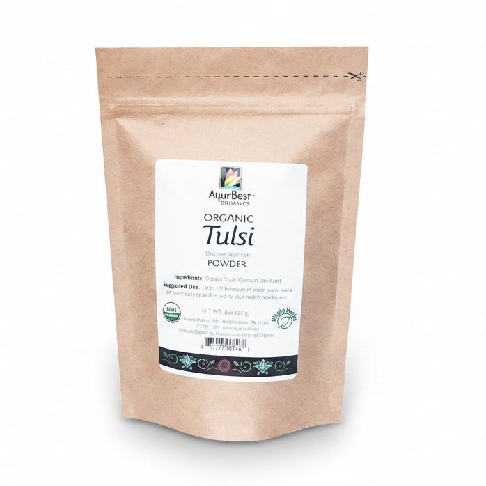 A bag of organic Tulsi powder, with a label showing the product name and '8 oz (227g) ' volume indication and organic certification.